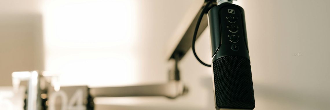 Comparison of Descript and Adobe Podcast features, pricing, and workflow in a side‑by‑side review.