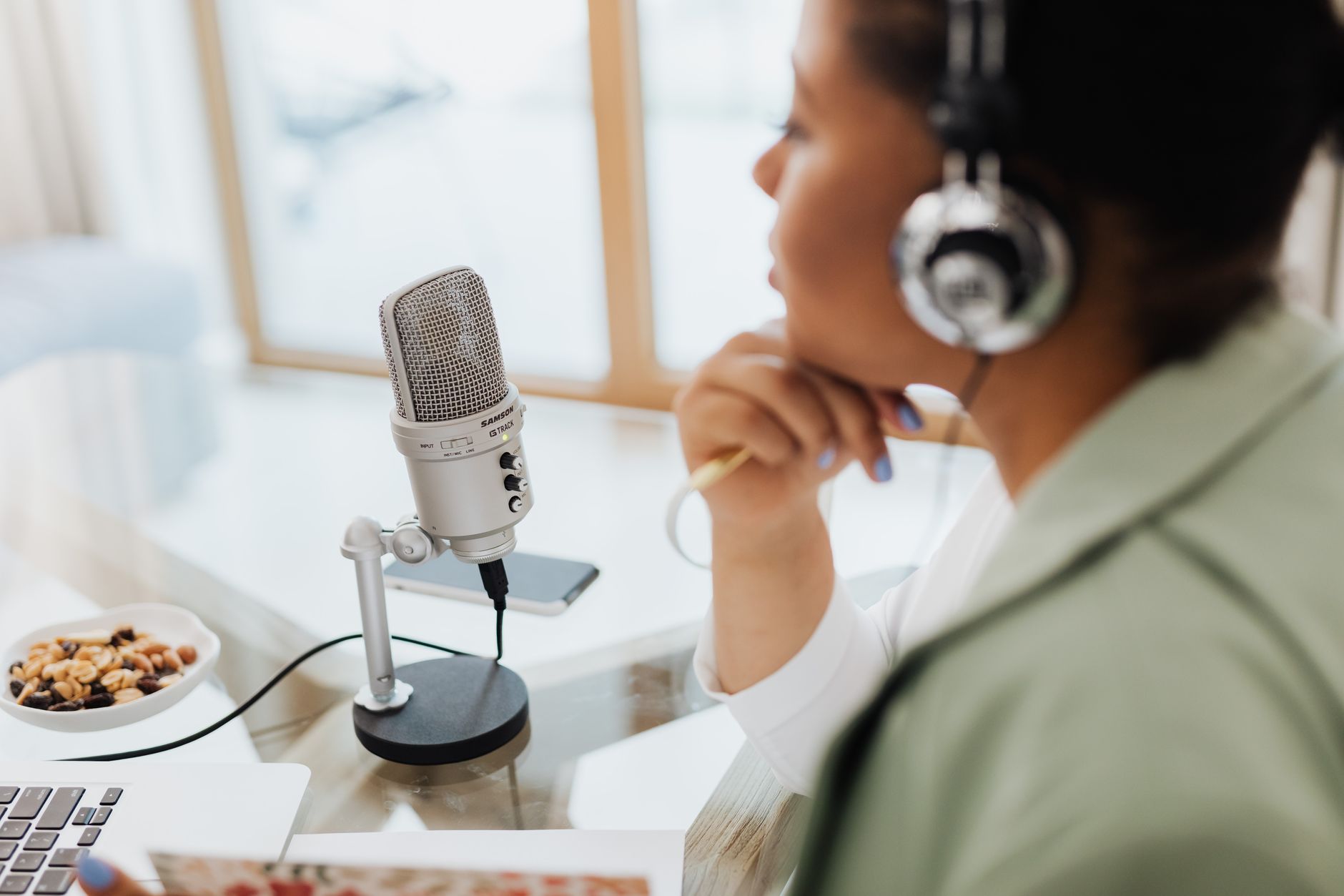 Comparative overview of Descript and Adobe Podcast features, workflow, and pricing for creators.