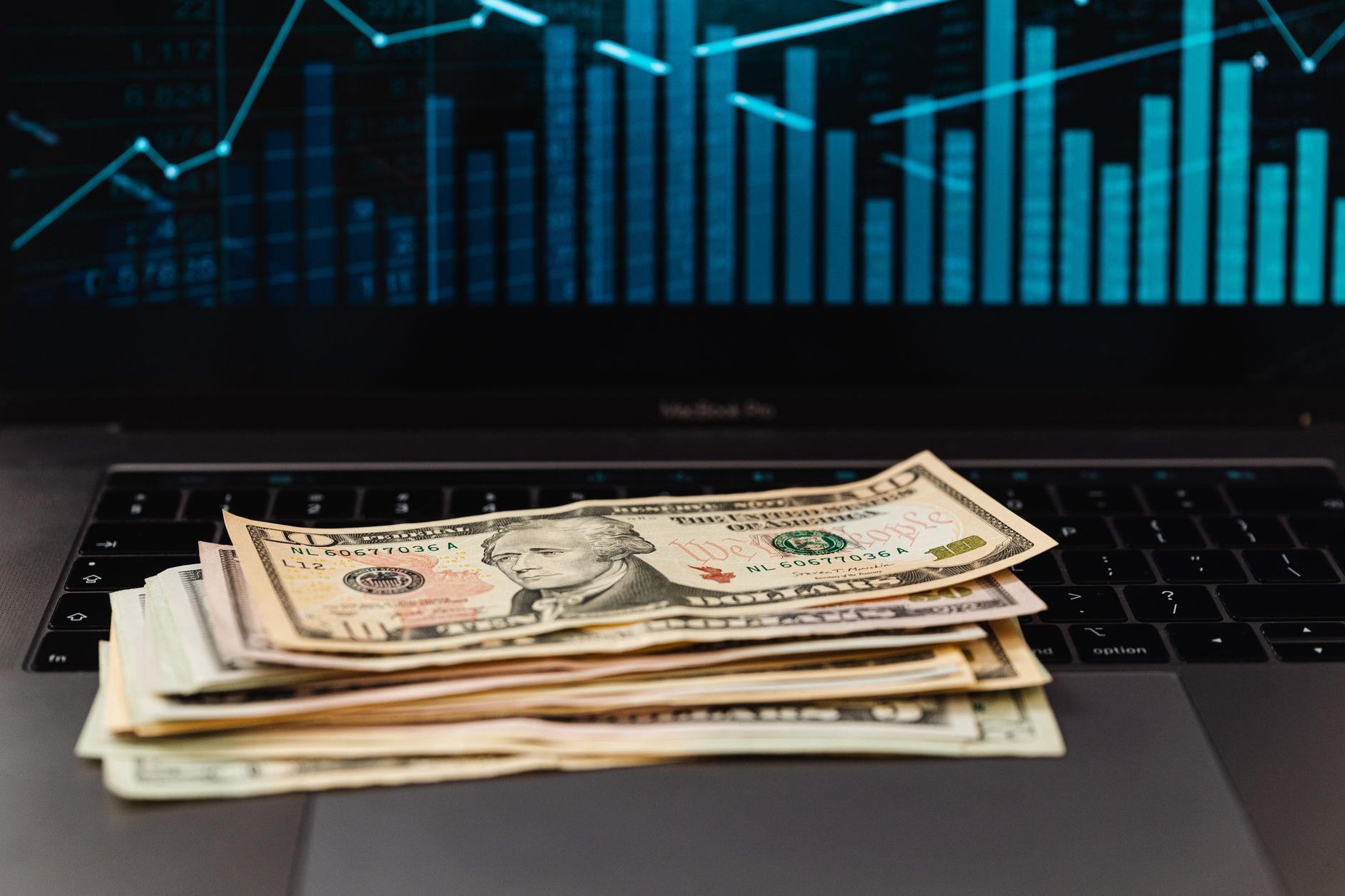 Person using AI tools to generate income through automated marketing and data analysis.