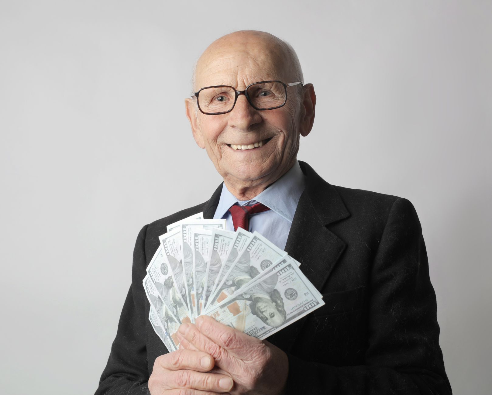 Colorful chart showing rapid wealth growth with upward arrows and money symbols